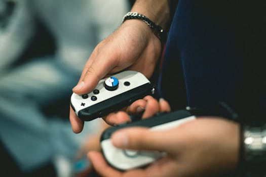 A detailed view of hands holding game controllers, perfect for gaming and technology themes.